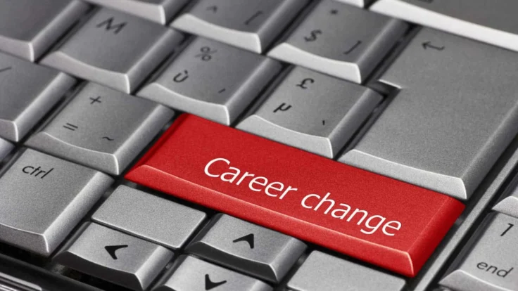 a computer keyboard with a red button that says career change