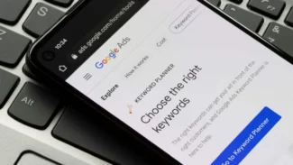 a close up of a cell phone on Google Ads to choose the right keywords